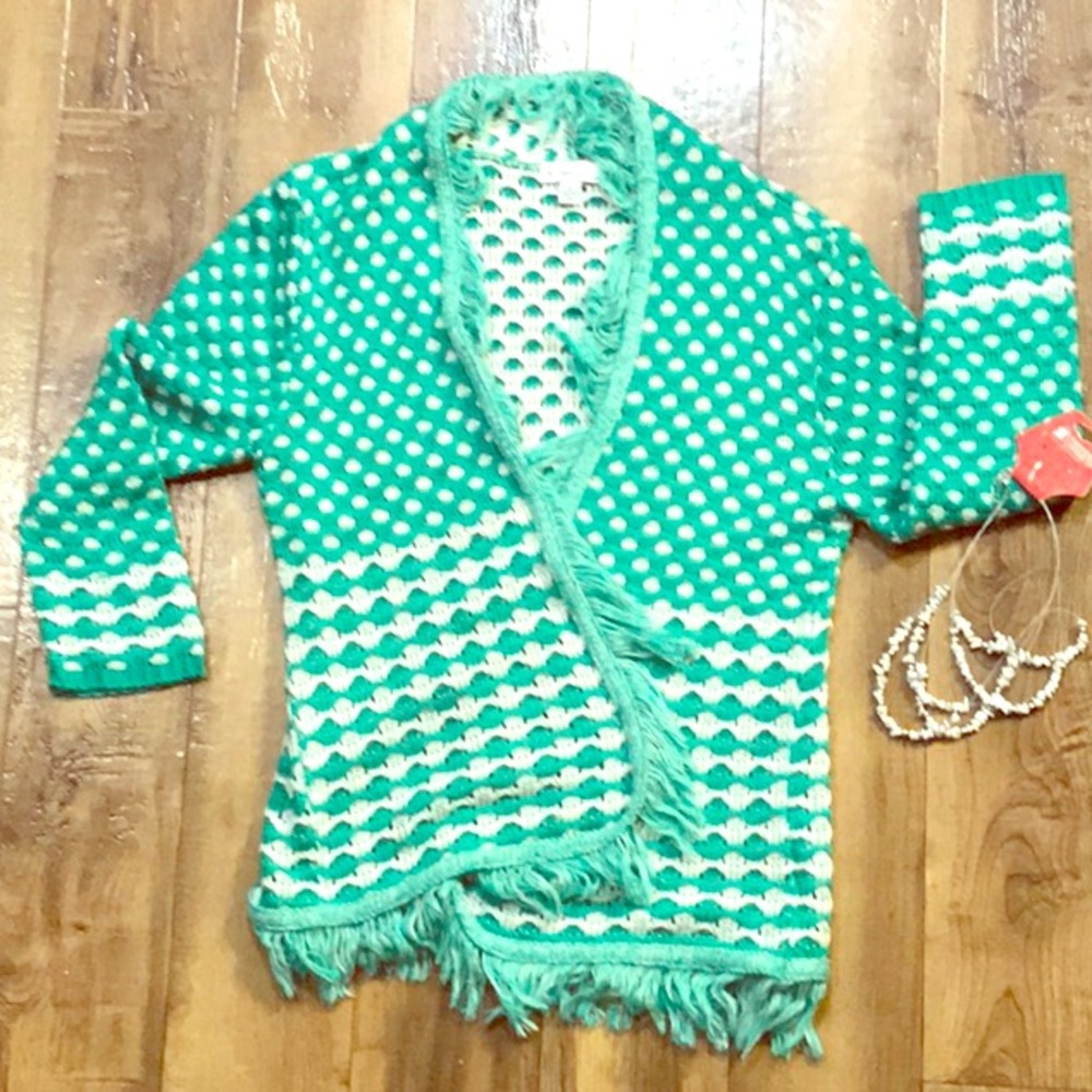 Kim Rogers over sweater necklace